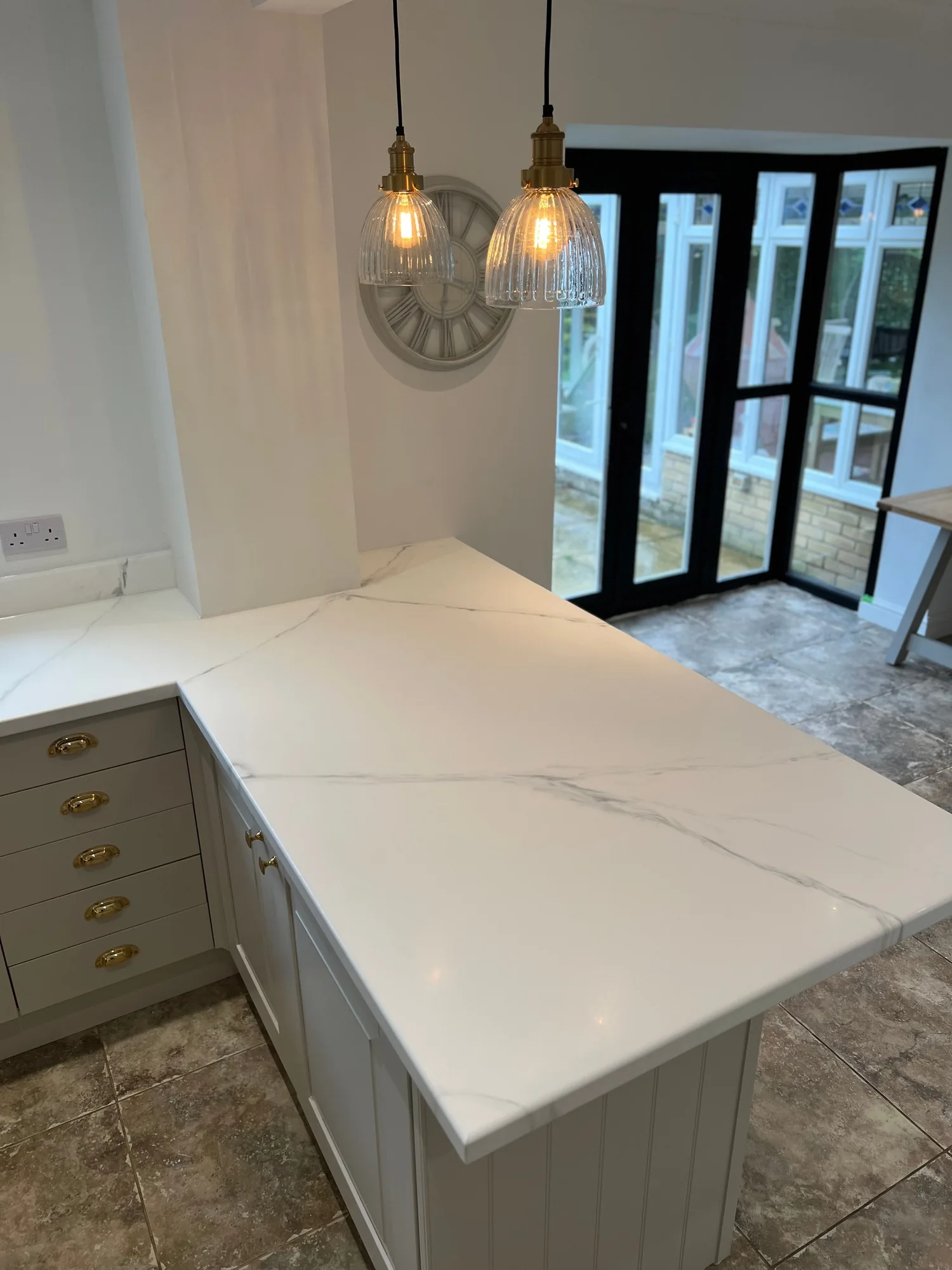 White marble effect worktop on a kitchen island