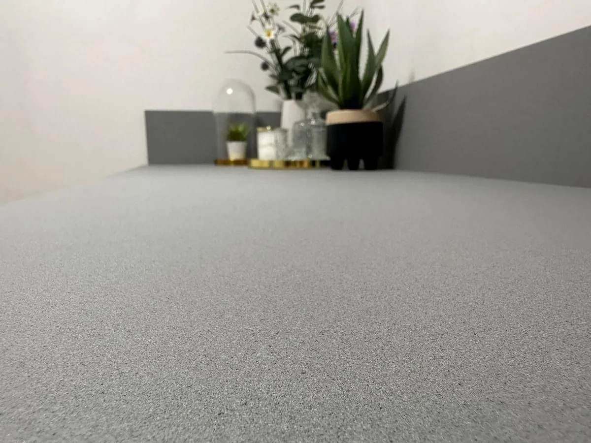 Close up of a grey speckled worktop finish