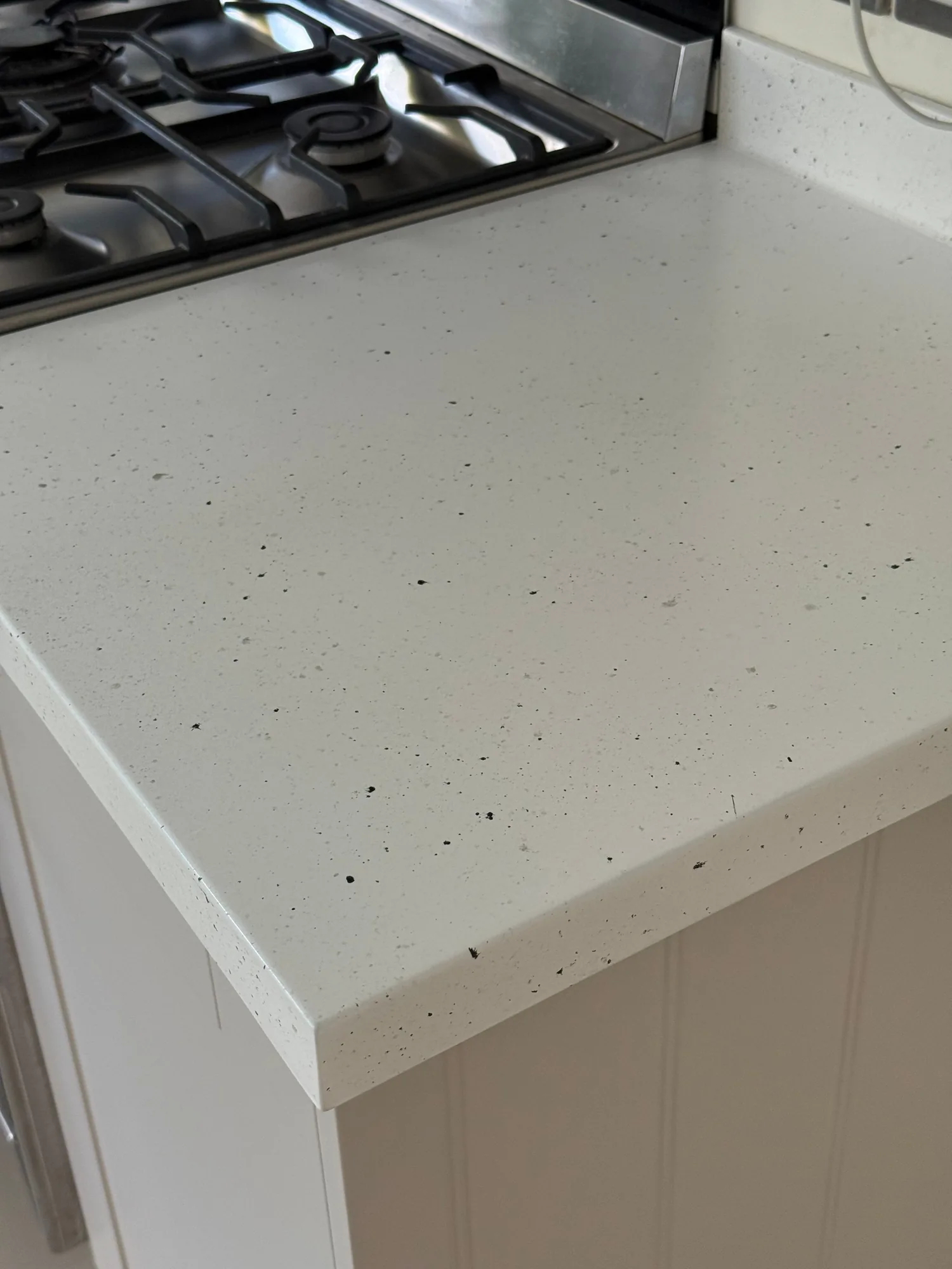 Close up of a white speckled worktop finish